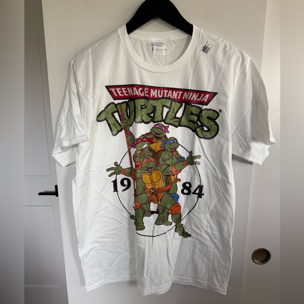 NWT Teenage Mutant Ninja Turtles Classic Circle 1984 T-Shirt Size Large Unisex